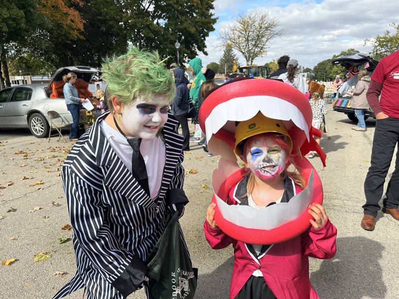 Christopher and William Heilman, ages 9 and 5, of Oregon, came dressed as Bettlejuice characters to the Evangelical Free Church of Mt. Morris Trunk or Treat held in conjunction with the Fall Family Festival in the village's square on Sunday, Oct. 13, 2024.