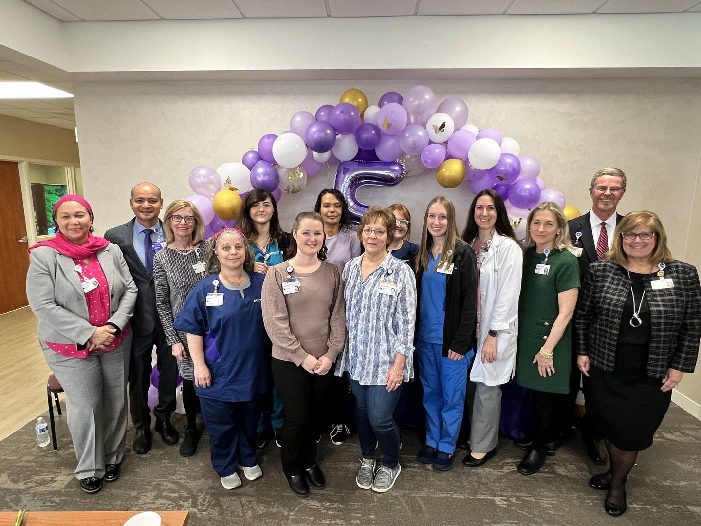 The Homeward Healing Team and Northwestern Medicine Valley West Hospital executives gather to celebrate the fifth anniversary of the swing bed program.