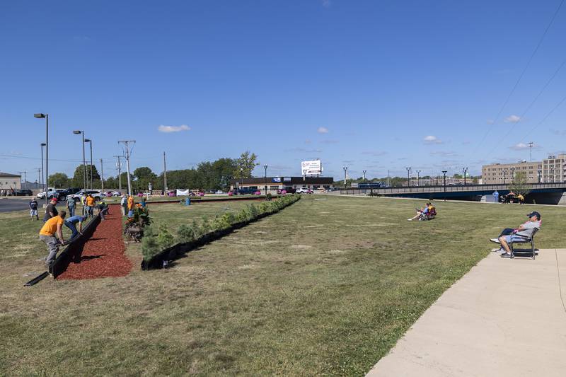 Workers prepare to construct the Vietnam Traveling Memorial Wall Thursday, August 31, 2023 at RB&W Park in Rock Falls.