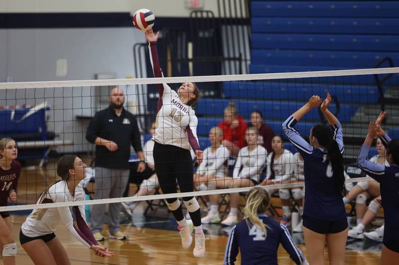 Morris’ Ava Smith goes up for the kill against Plainfield South on Monday, Sept. 25, 2023 in Plainfield.