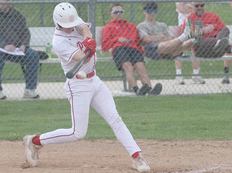 Ottawa's Lucas Farabaugh makes contact with the ball against L-P on Friday, May 2, 2025 at Ottawa High School.