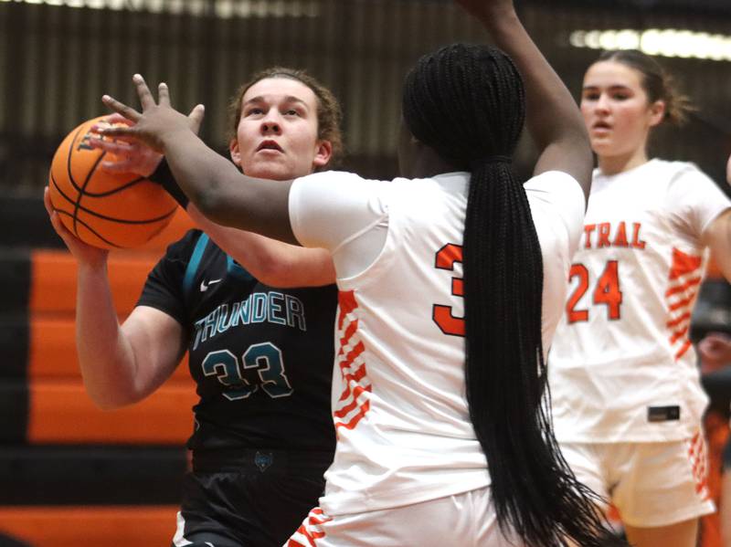 Woodstock North’s Jade Slinko moves the ball in varsity girls basketball on Monday, Jan. 26, 2026, at Crystal Lake Central High School in Crystal Lake.