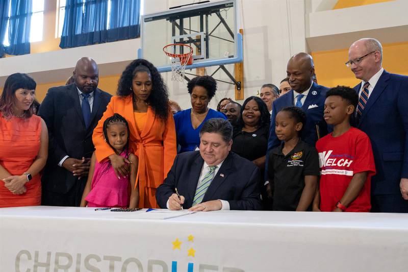 Gov. JB Pritzker signs the Fiscal Year 2024 state budget into law Wednesday, June 7, 2023.