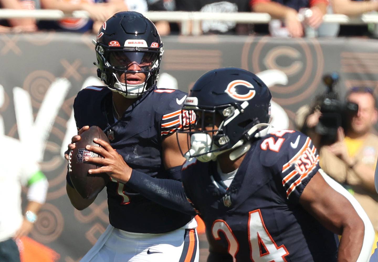 Chicago Bears quarterback Justin Fields looks for a receiver during their game against the Denver Broncos Sunday, Oct. 1, 2023, at Soldier Field in Chicago.