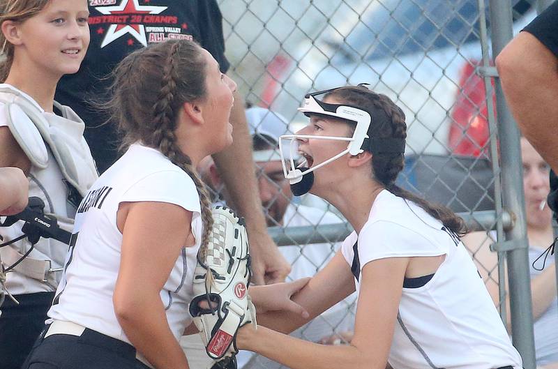 Spring Valley's Brynn Pellegrini and Reese Baltikauski react in between innings while facing Evergreen Park in the Minor League Softball State title game on Thursday, July 27, 2023 at St. Mary's Park in La Salle.