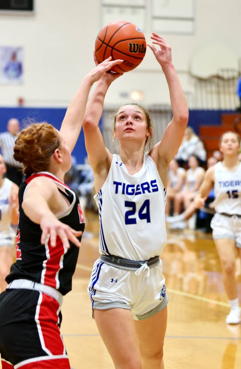 Princeton's Keighley Davis shoots over Henry's Brynna Anderson Tuesday night at Prouty Gym.