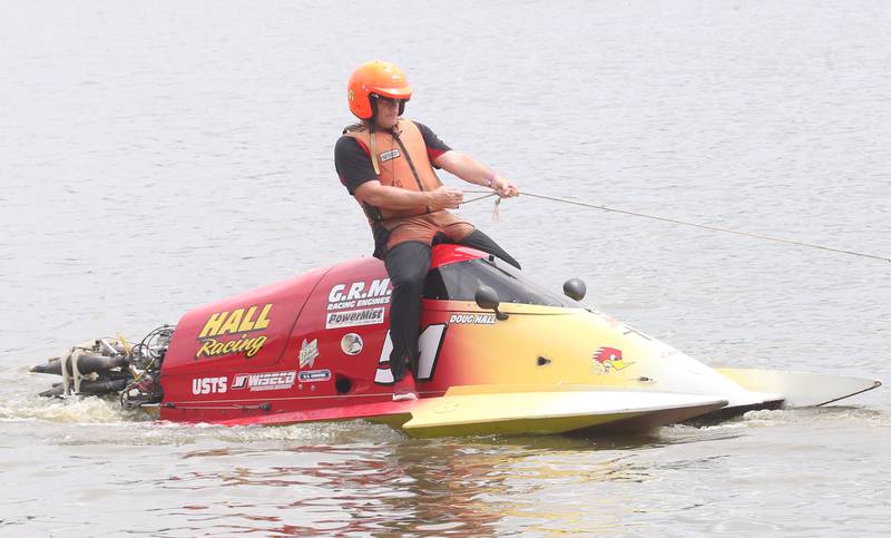 Doug Hall of DeKalb Mo. gets a tow in during The US Title Series (USTS) Pro National Championship Boat Races on Friday, July 25, 2025 in DePue.