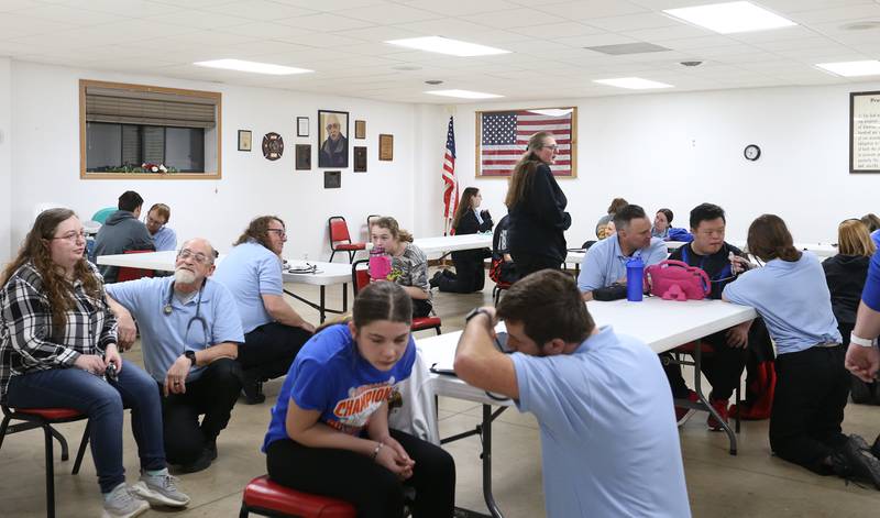 EMT Basic students interact with special needs students on Thursday, March 7, 2024 at the McNabb Fire Department. EMT Basic students trained with special needs students in Putnam County on how to work with the special needs kids so they will feel more comfortable and understand what will happen in an emergency. The training gave the EMT Basic students hands-on training on working with the special need students.