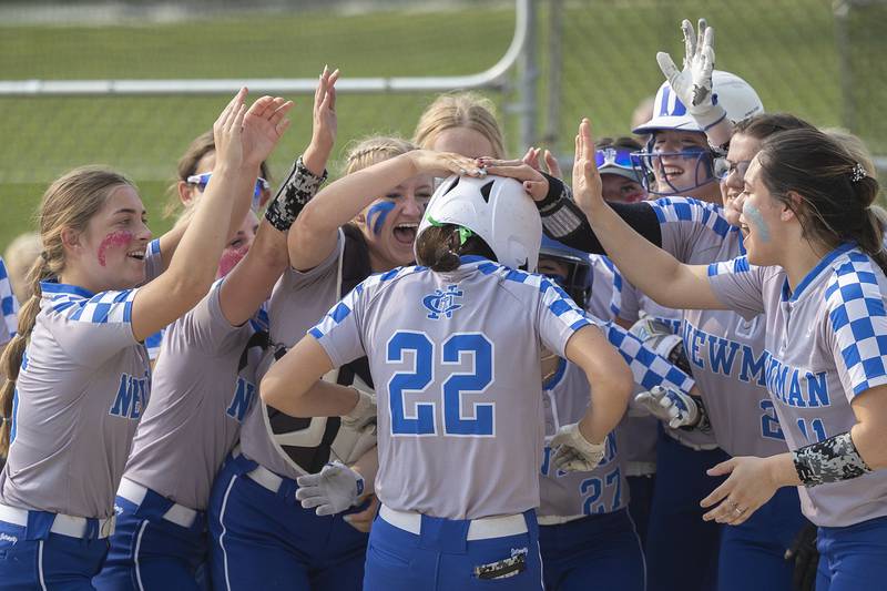 Teammates celebrate Newman’s Madison Duhon’s two-run homer against Putnam County Thursday, May 18, 2023.