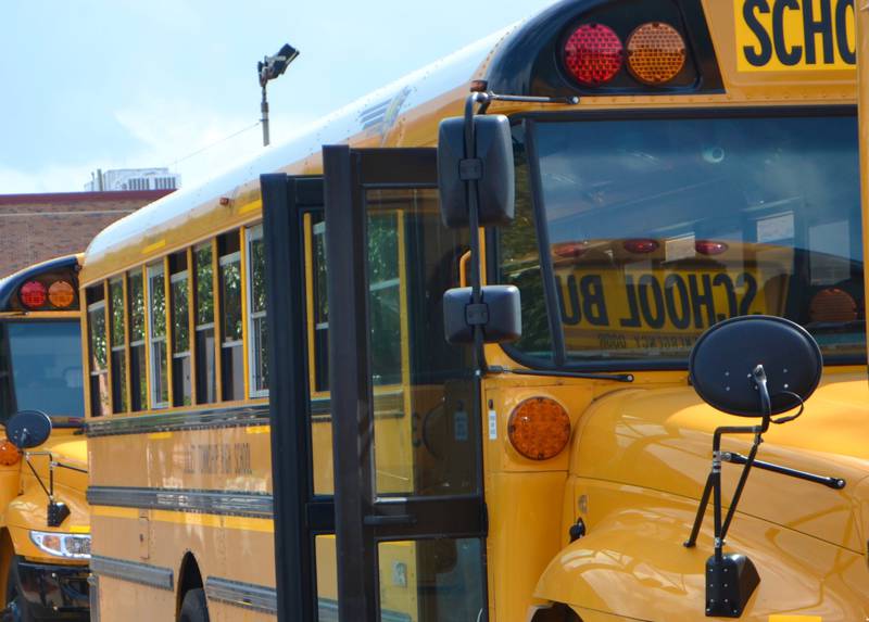 File photo of school buses in Joliet in 2021.