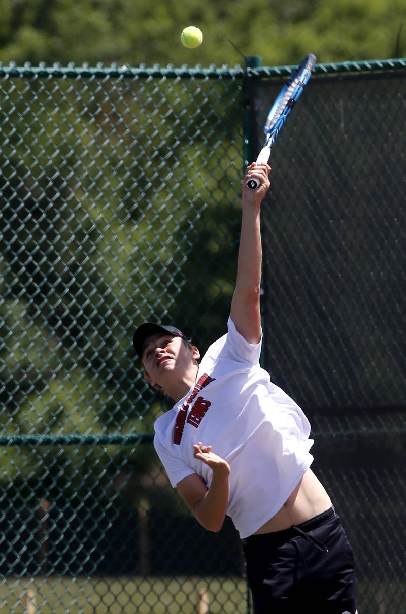 Hinsdale Central’s Alex Kotarski serves the ball during an IHSA 2A boys singles tennis match Thursday, May 25, 2023, at Barrington High School.