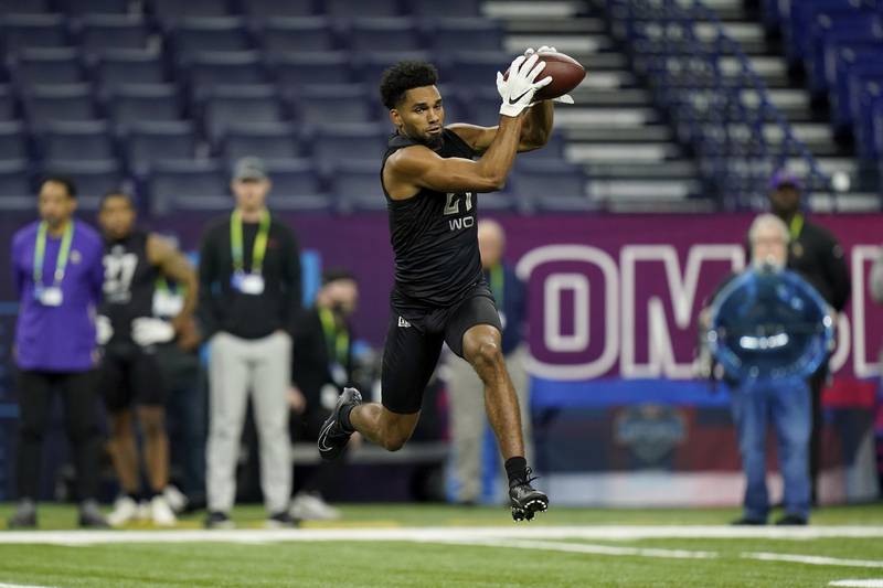 Ohio State wide receiver Chris Olave participates in a drill on  Thursday, March 3, 2022, at the NFL scouting combine in Indianapolis.