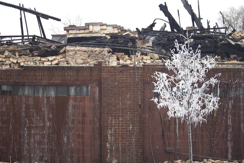 The destroyed remains of a commercial building seen on Friday, Jan. 30, 2026, near South Eastern Avenue and Washington Street in Joliet. The building was demolished following a fire on Thursday, Jan. 29, 2026.