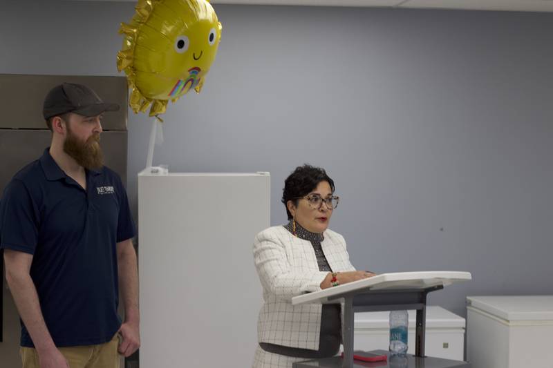 Skyler Reed (left), Joliet Township food pantry coordinator, stands with Joliet Township Supervisor Alicia Morales on Monday, April 21, 2025, for a ribbon-cutting ceremony for the food pantry at the township's Forest Park Community Center in Joliet.