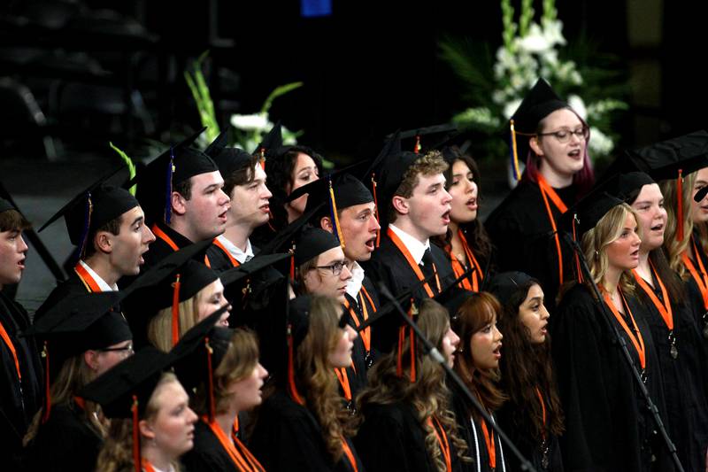 Senior members of the St. Charles East choir perform during the school’s 2025 commencement ceremony on Thursday, May 22, 2025 at Northern Illinois University in DeKalb.