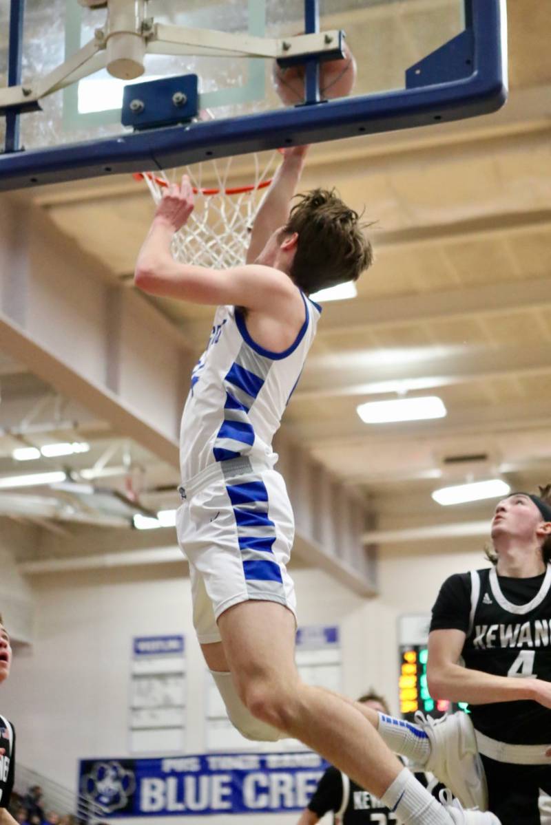 Princeton's Grady Thompson takes in a first-half layup against Kewanee Tuesday night at Prouty Gym. The Tigers won 66-44.