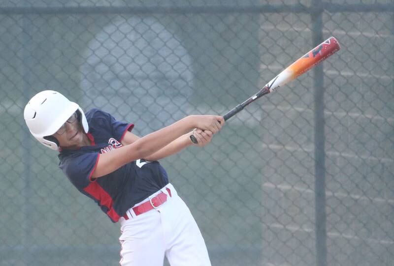 Streator All Stars Ben Mascode connects with a hit against Ottawa American during the District 20 championship game on Sunday, July 14, 2024 at Washington Park in Peru.