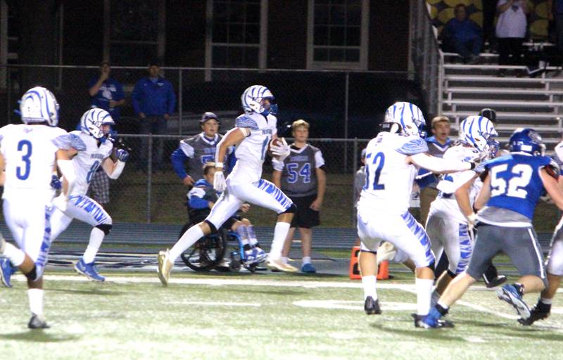 Princeton’s Noah Laporte runs for the end zone after intercepting the ball during a game at Newman on Friday, Sept. 8, 2023.