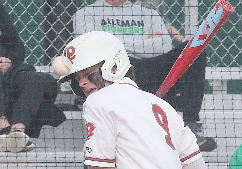 L-P's Brevyn Vogel gets hit in the helmet by a pitch against Alleman on Tuesday, March 12, 2024 at the L-P Athletic Complex in La salle.