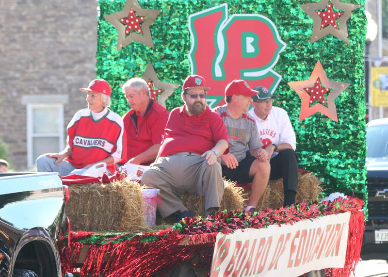 The L-P Board of Education ride in the Homecoming parade on Thursday, Oct. 5, 2023 downtown Peru.