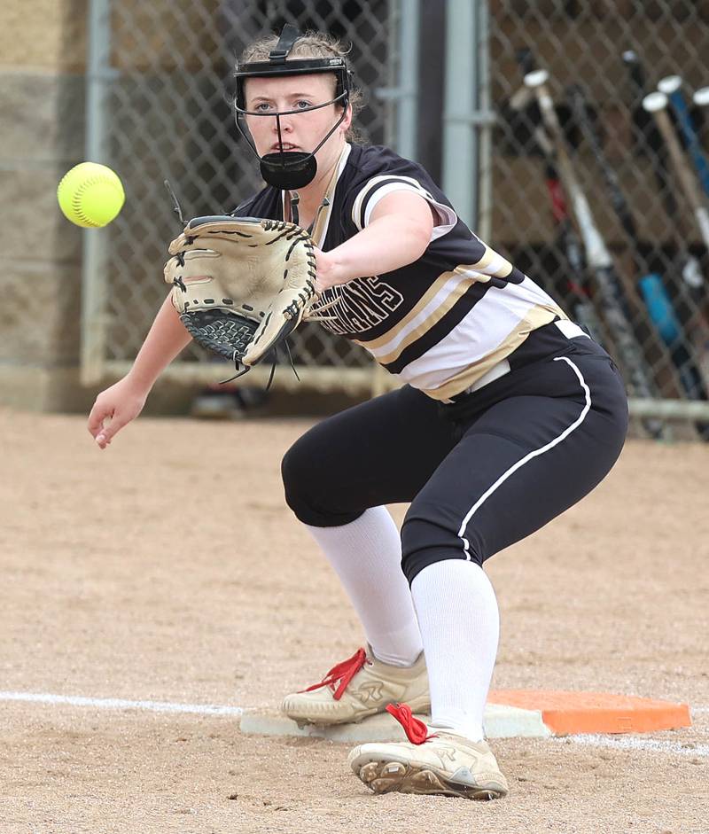 Sycamore's Brighton Snodgrass stretches for a throw during their game against DeKalb Friday, May 20, 2022, at Sycamore High School.