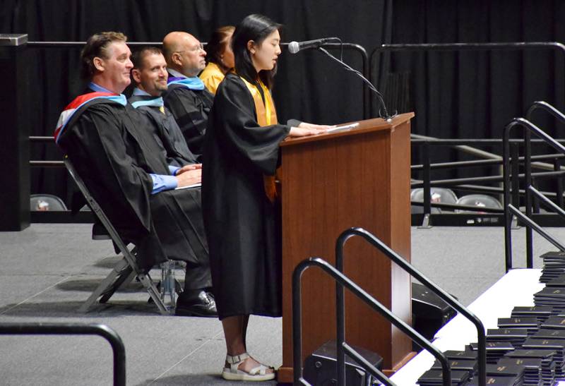 Sycamore High School's Class of 2022 Valedictorian Mira Ryu addresses the crowd during the commencement ceremony, held Sunday, May 22, 2022 at Northern Illinois University's Convocation Center in DeKalb.
