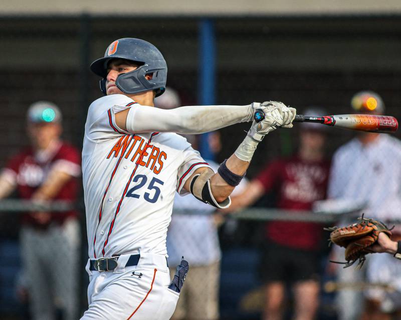 Oswego's Tyler Stack (25) swings at a pitch during Class 4A Romeoville Sectional semifinal game between Plainfield North at Oswego.  June 1, 2023.