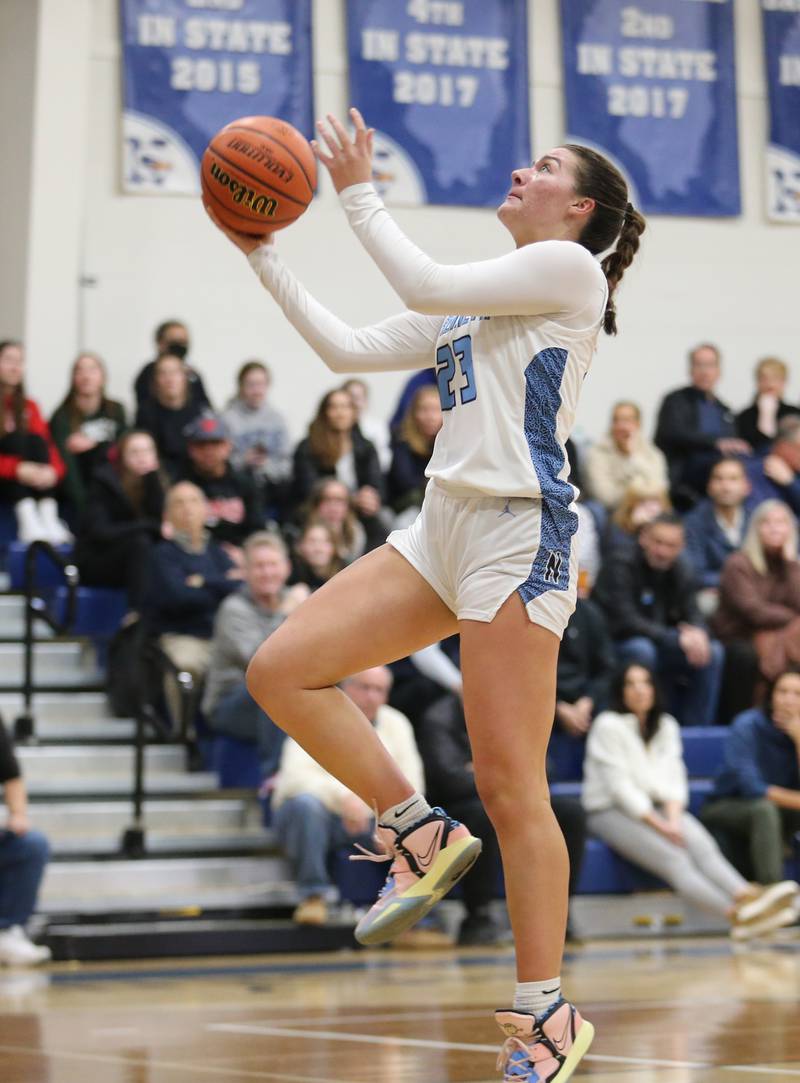 Nazareth's Danielle Scully (23) goes in for a layup during the girls varsity basketball game between Fremd and Nazareth on Monday, Jan. 9, 2023 in La Grange Park, IL.