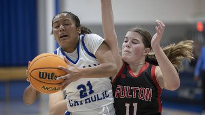 Photos: Newman faces off against Fulton in girls basketball