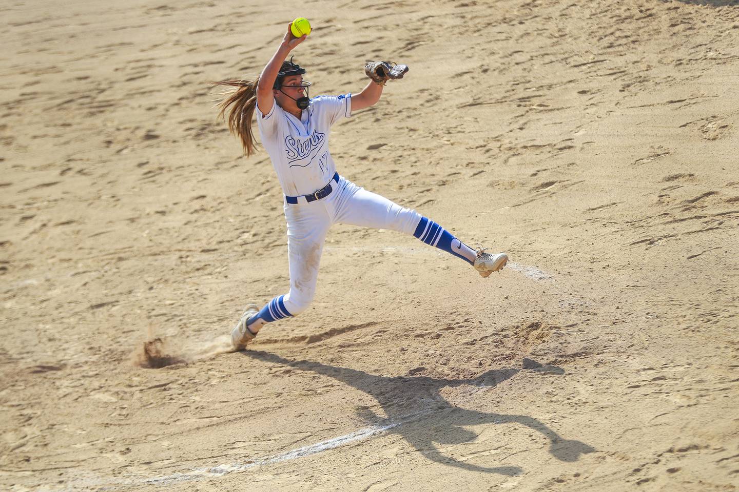 St. Charles North pitcher Ava Goettel winds up on Monday, June 14, 2021, at Carl Sandberg High School in Orland Park, Ill. The Knights defeated the Stars 5-4.