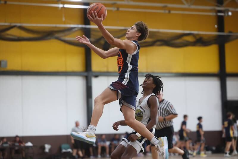 Oswego’s Mariano Valasco goes in for the layup against Central Catholic at the 37th Morris Boys Shootout on Tuesday, June 25, 2024.