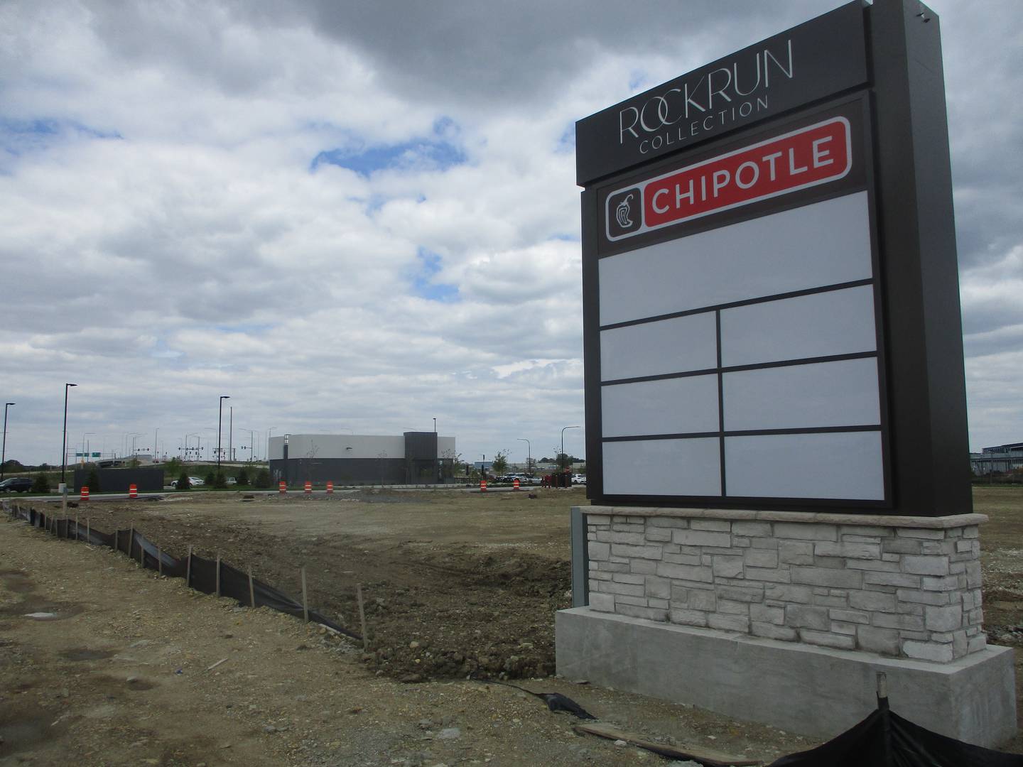 A sign at Rock Run Collection designates the Chipotle, the first stand-alone restaurant to open in the development. Plans are underway for a Culvers and Chick-fil-A. May 6, 2026
