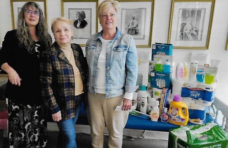(L-R) Chapter Vice Regent Elizabeth Hauger, Chapter Regent Nancy Gartner and Volunteer Coordinator and Trainer for Freedom House Bonnie Anders.