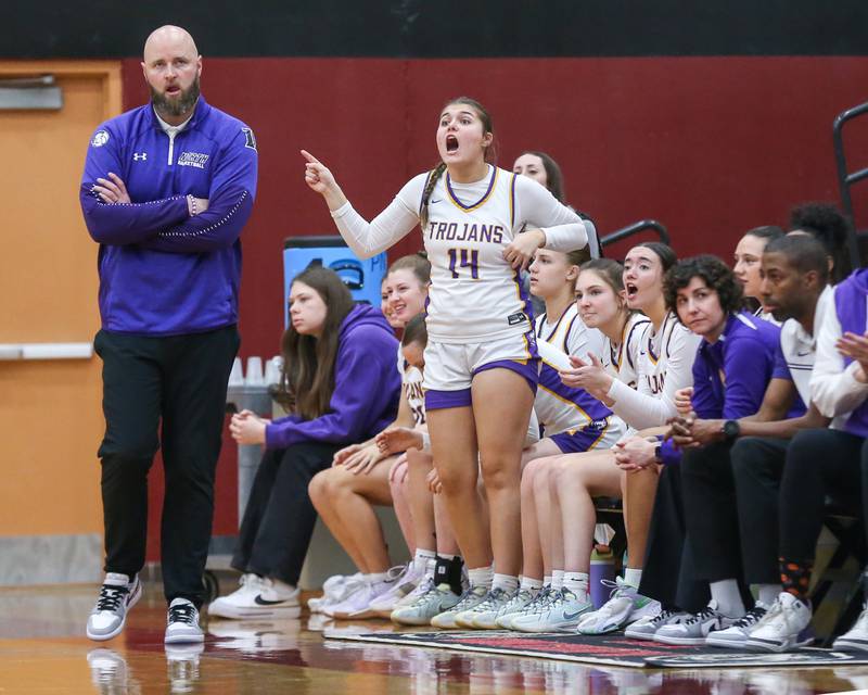 The Downers Grove North' bench cheers on the team during their Regional Final basketball game between Downers Grove North at Plainfield North. Feb 20, 2025 in Plainfield.