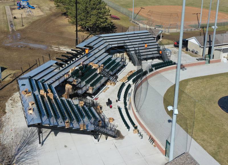 Workers from Hayden Construction installed box seats at Schweickert Stadium on Monday, March 6, 2023 in Peru. The stadium home of the Pistol Shrimp grandstand was approved by the Peru City Council last June. This phase included 575 box seats, a new grandstand and press box.