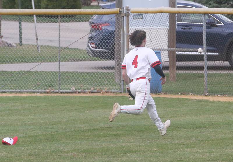 Streator's Noah Camp chases after a ball that gets by him in the outfield against Hall on Wednesday, March 13, 2024 at Kirby Park in Spring Valley.