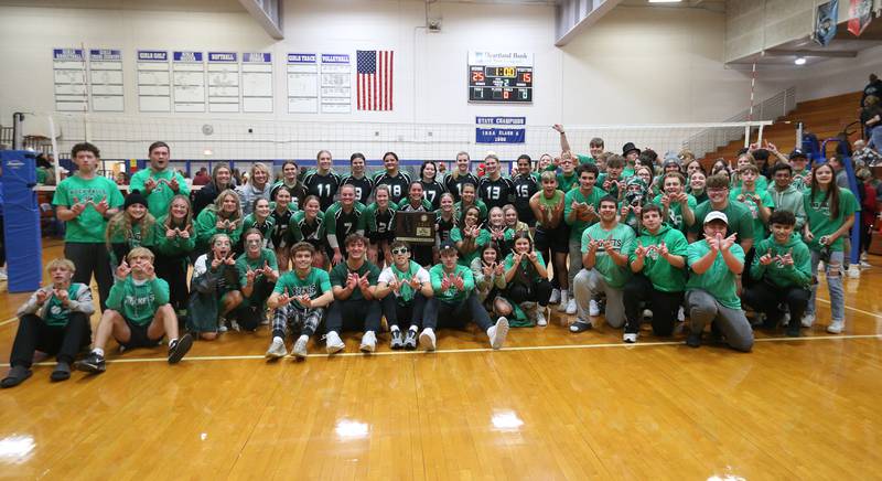Members of the Rock Falls volleyball team pose with super fans defeating Illinois Valley Central during the Class 2A Sectional final game on Wednesday, Nov. 1, 2023 at Princeton High School.