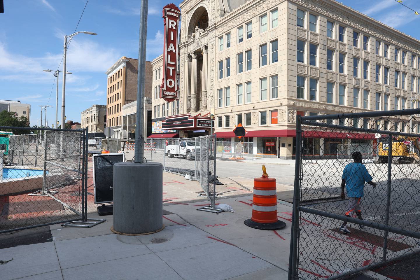 A maze of fencing for pedestrain traffic is put up as phase one to improve water and sewer line begins for the new City Square in downtown Joliet on Wednesday, Aug. 7, 2024.