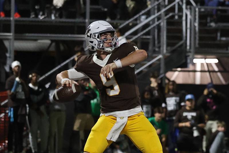 Mount Carmel’s Jack Elliott looks to pass against Joliet Catholic on Friday, Oct. 11, 2024 in Chicago.