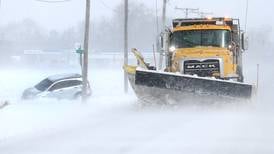 Photos: March snowfall, wind cause hazardous travel conditions in DeKalb County