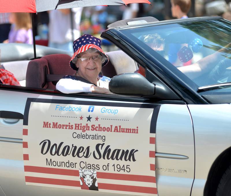 Dolores Shank, a Mt. Morris High School graduate of 1945, rode in the Let Freedom Ring parade on July 4 in the Mt. Morris High School Alumni entry.