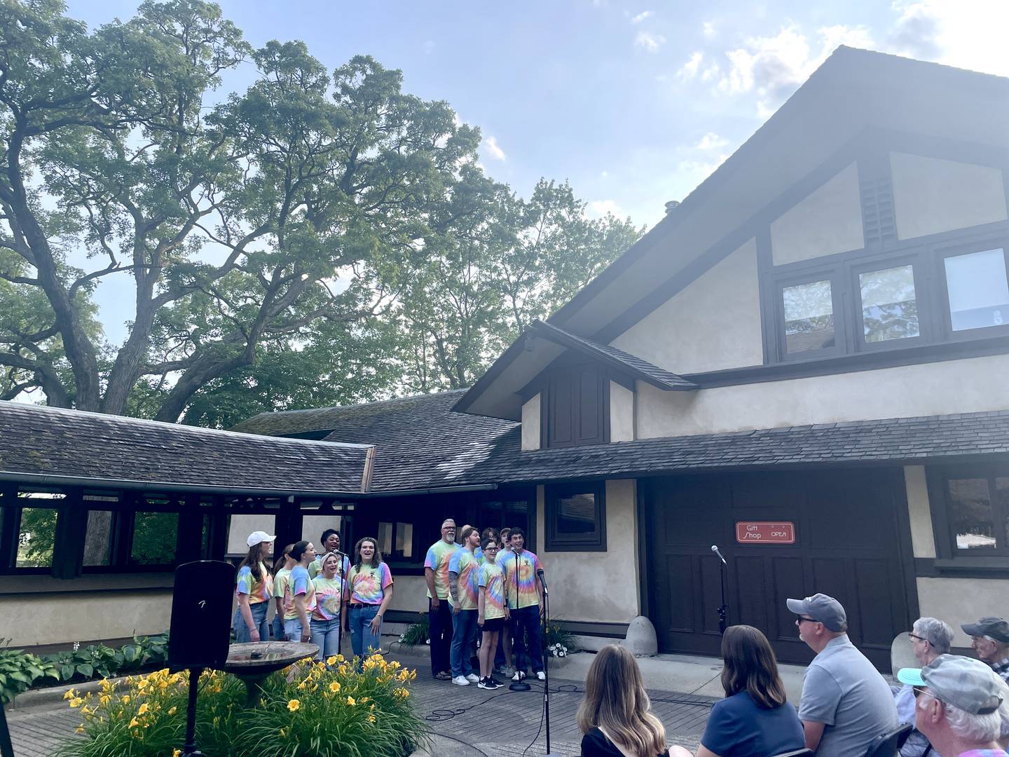 Cast members of Acting Out Theatre Co.'s "Godspell" perform a selection of songs on June 17, 2025, during Wright in Kankakee's Sip, Shop and Stroll event at The B. Harley Bradley House. The musical will take place at The Grove in Bourbonnais on July 18, 19 and 20.