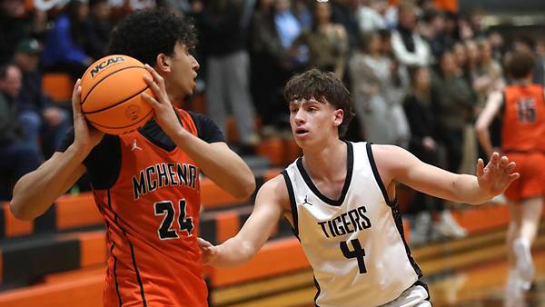 Photos: McHenry vs. Crystal Lake Central, FVC boys basketball