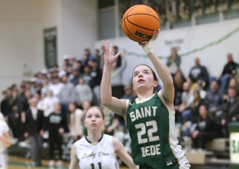 St. Bede's Bailey Engels drives to the hoop to score against Marquette during the Class 1A Regional semifinal game on Tuesday, Feb. 18, 2025 at St. Bede Academy.