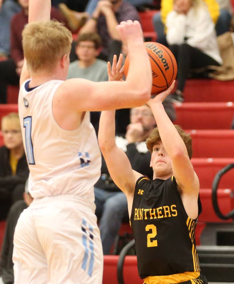 Putnam County's Drew Taliani shoots a jump shot over Bureau Valley's Bryce Helms during the 49th annual Colmone Class on Thursday, Dec. 7, 2023 at Hall High School.