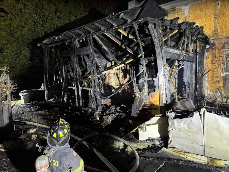 No one was injured in a garage fire in Oswego on Oct. 11 that spread to a neighbor’s house.