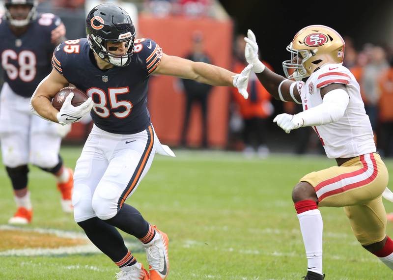Chicago Bears tight end Cole Kmet tries to fend of San Francisco 49ers free safety Jimmie Ward during their game Sunday, Oct. 31, 2021, at Soldier Field in Chicago.