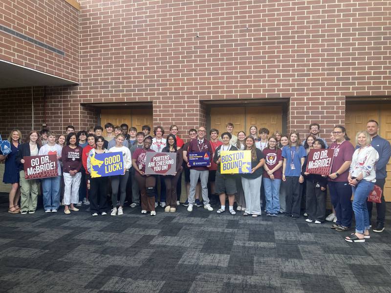 Dr. Robert McBride stands with members of the LTHS pep band on Friday, April 17, 2026.