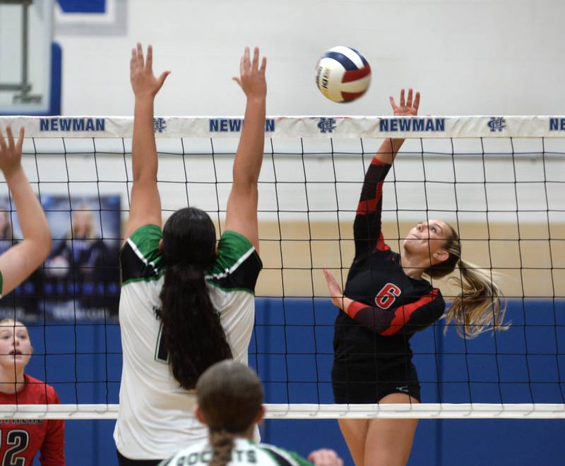 Erie-Prophetstown's Jamie Neumiller (6) hits the ball over Rock Falls defenders during the championship of the 2A Sterling Newman Regional on Thursday, Oct. 31, 2024.