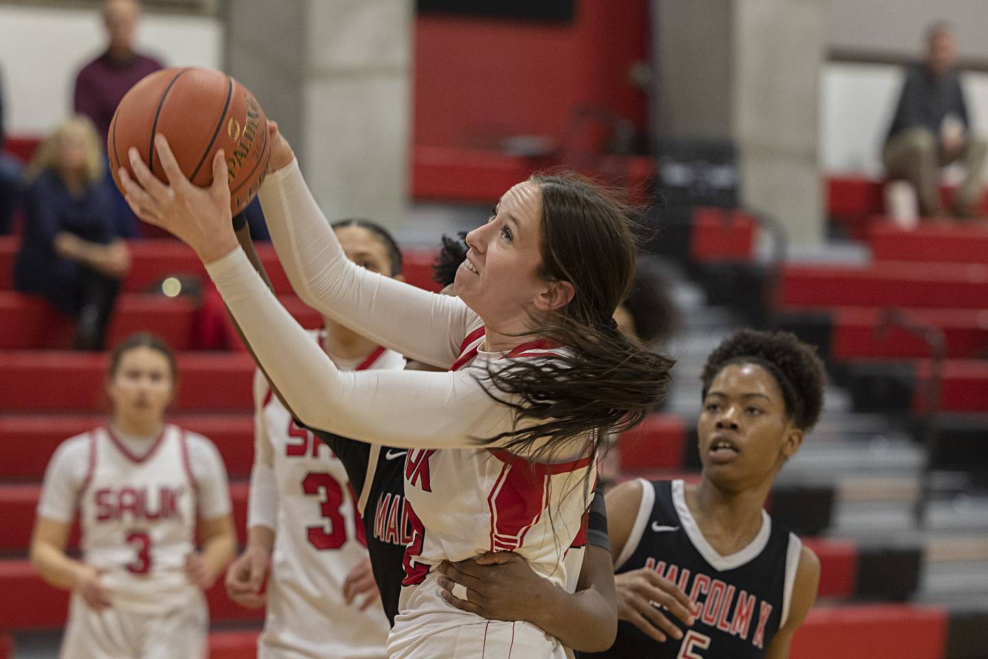 SVCC’s Shelby Veltrop grabs a pass below the basket against Malcom X Monday, Feb. 23, 2026.